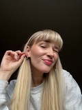 Sara wearing Ocean Aura hoops made from 925 pure sterling silver plated with a durable 18 karat gold plating.