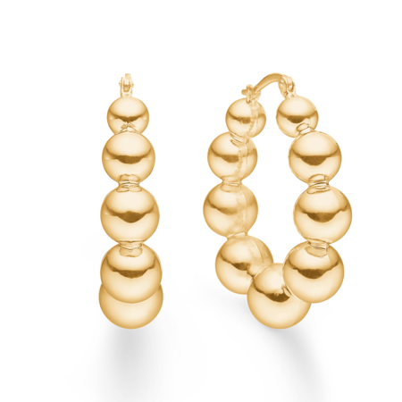 BIGGEST BALL earrings in 14 karat gold.