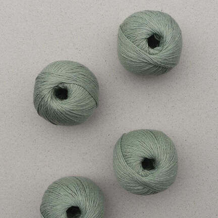 4 garnnoegler af market sole fra pascuali i farven agave