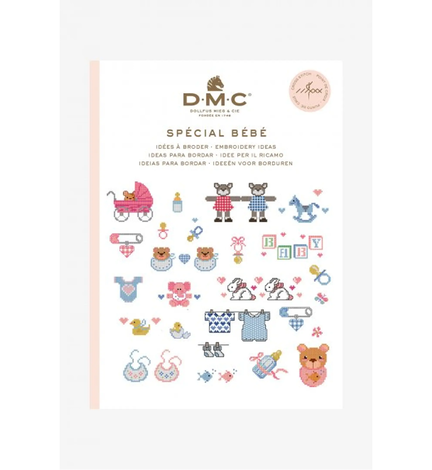 forside paa bog fra dmc med broderimoenstre temaet baby med mange broderede babymoenstre paa forsiden