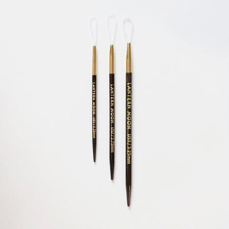 3 uldnåle fra lanterne moon i ibenholt, viser målene 2,25 2,75 og 3,25