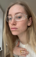 Nana wearing Wild Cliff earrings made in 925 pure sterling silver with a durable coating of 18 karat gold plating set with fine white zirconia.