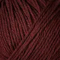 close up af garnoegle fra knitting for olive heavy merino farve bordeaux