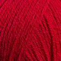 close up af garnnoegle merino fra knitting for olive i farven ribsroed