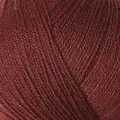 close up af garnnoegle merino fra knitting for olive i farven vinroed