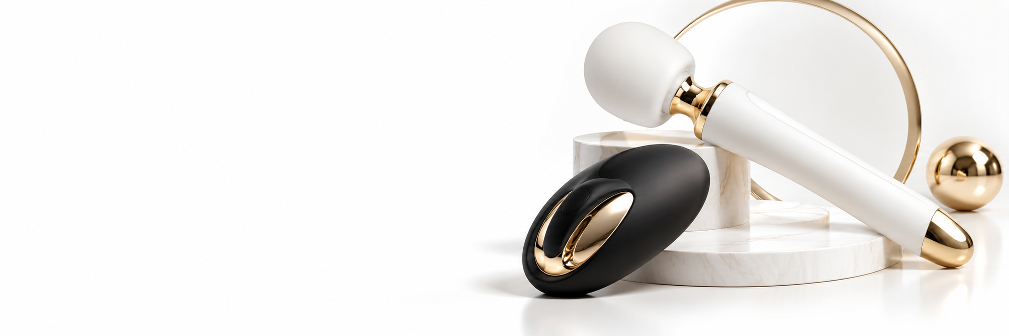 Elegant massager i sort, hvid og guld