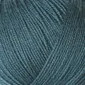 close up af garnnoegle merino fra knitting for olive i farven petroleumsgroen