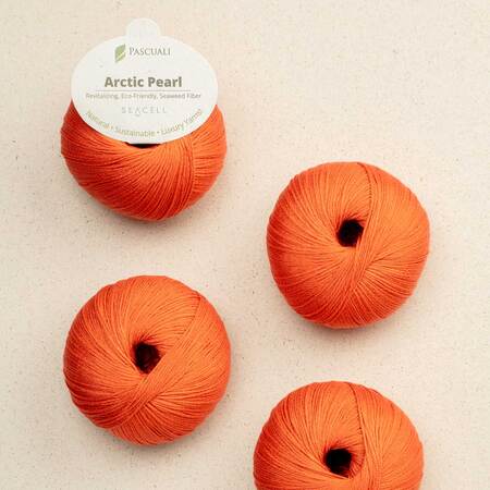 4 garnnoegler i kvaliteten arctic pearl fra pascuali i farven orange