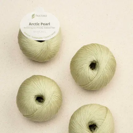 4 garnnoegler i kvaliteten arctic pearl fra pascuali i farven pistachio