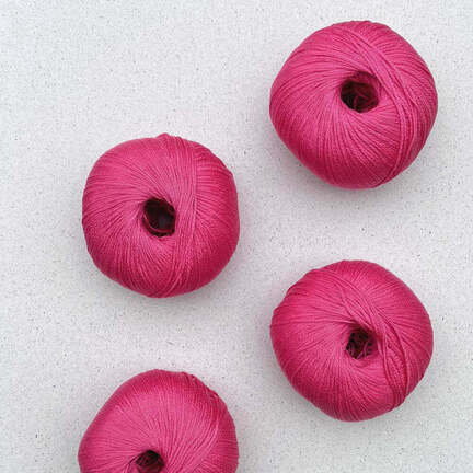 4 garnnoegler i kvaliteten arctic pearl fra pascuali i farven coral 08