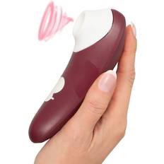 Tryk- og luftbølgestimulator i hånd – luksus klitorisstimulator