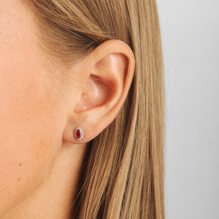 Scarlet Bloom earrings in 14-carat gold, as modelled