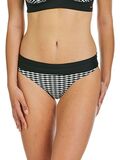En kvinde iført sort- og hvidternede bikinitrusser med ensfarvet sort linning, vist fra midt på torsoen til øverst på lårene.