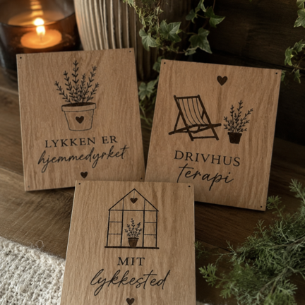 Dekorative skilte til drivhus og have i hyggeligt miljø med planter