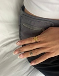 Mathilde wearing Starfish Lustre ring made of 925 pure sterling silver plated with 18 carat gold plating.