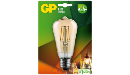 Emballage til en GP LED-lampe med en pære i vintage-stil med synlige filamenter. Emballagen inkluderer energieffektivitetsdetaljer, der viser 470 lumen og 37W tilsvarende. Baggrunden har grønne og orange nuancer med et billede af en tændt pære.