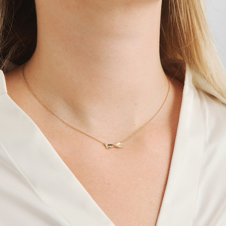 Diamond Bow necklace in 14-carat gold, as worn by the model
