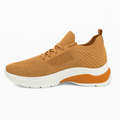 Beige unisex sneaker i strik med hvid og orange sål