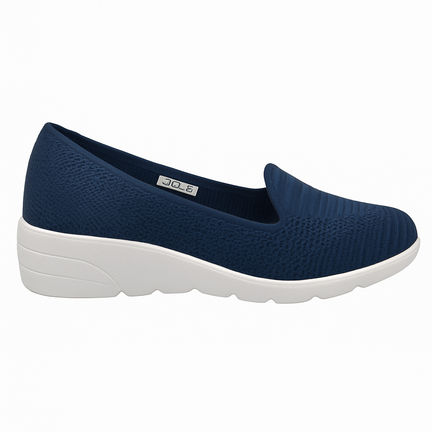 Navy blå slip-on damesko med hvid sål i strikket tekstil