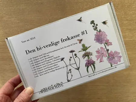 Kasse med før til bivenlige blomster