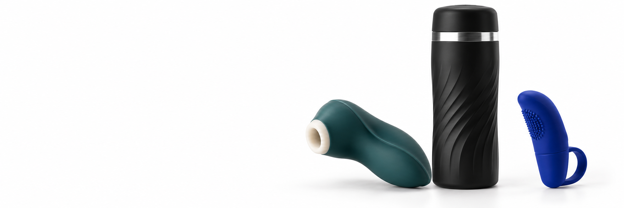 Masturbator, lufttryksstimulator og fingervibrator på hvid baggrund