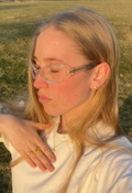 Nana wearing Wild Cliff ring made in 925 pure sterling silver plated with 18 carat gold plating with a white zirconia.