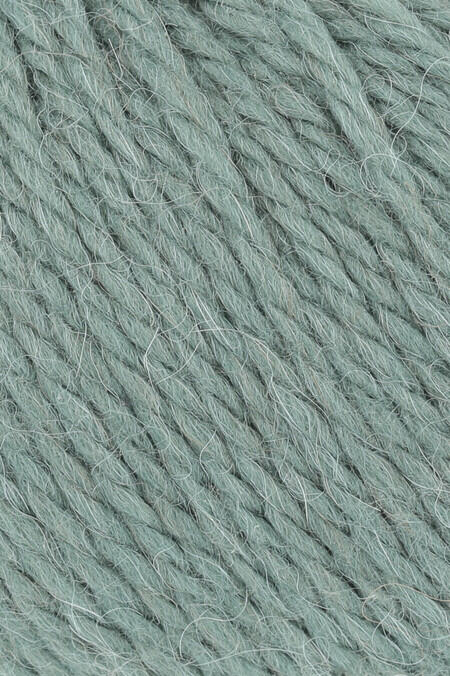 close up af garnnoegle af maerket carpe diem fra lang yarns i farven efeu