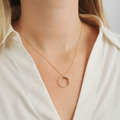 Diamond Duet pendant in 14-carat gold, as shown on the model