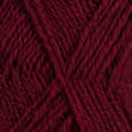 Close up af garnnøgle Rauma Finull garn i farven 497 burgunder