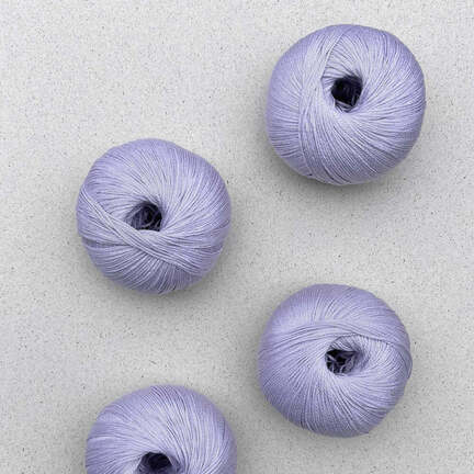 4 garnnoegler i kvaliteten arctic pearl fra pascuali i farven 11 crocus