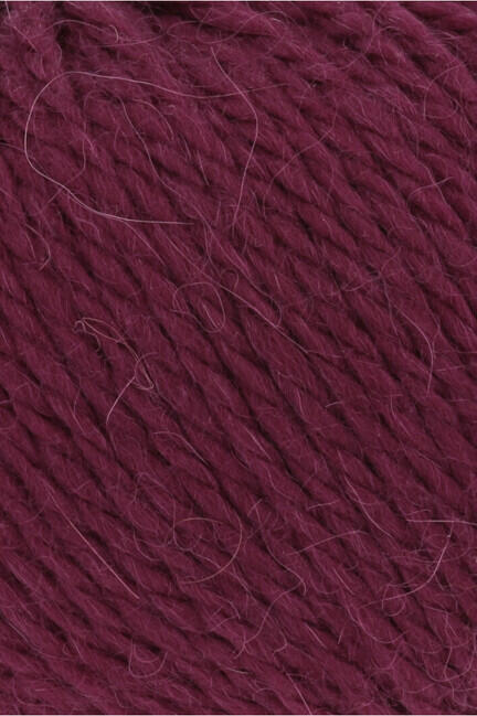 close up af garnnoegle af maerket carpe diem fra lang yarns i farven rubinroed