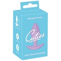 Emballage til Cuties Mini Butt Plug med illustration af den lilla buttplug i soft touch-silikone.