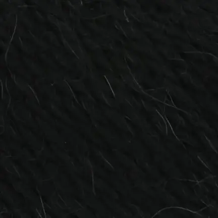 close up af garnnoegle af maerket carpe diem fra lang yarns i farven sort