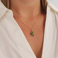 FOUR SEASONS SPRING pendant in 14-carat gold on a model | Mads Z