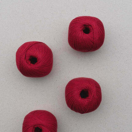 4 garnnoegler af market sole fra pascuali i farven rose hip