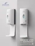 Automatisk hvid sæbedispenser fra Kencare Scandinavia monteret på en væg med integreret drypbakke.