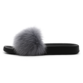 Dame slippers med grå faux fur rem og sort sål