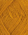 close up af garnet finull fra Rauma i farven moerk sennepsgul 4076