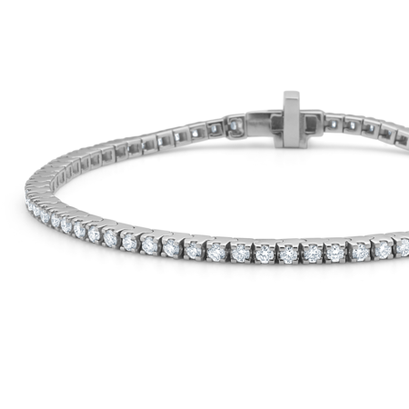 TENNIS bracelet in 14 karat white gold with 1.50 ct. diamonds.