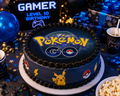 Pokémon GO sukkerprint A4 på fødselsdagskage til gamer fest med blå pynt