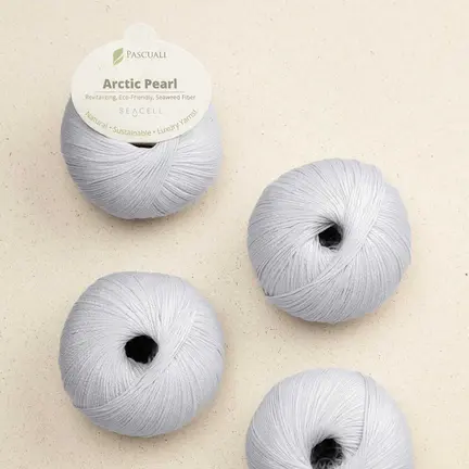 4 garnnoegler i kvaliteten arctic pearl fra pascuali i farven glacier 14