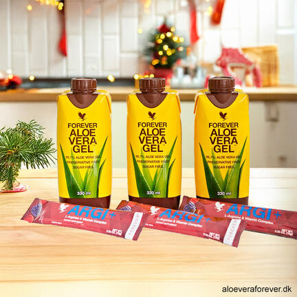 GelARGI+ Tri-Pak på køkkenbord med julestemning - ARGI+ og Forever Aloe Vera Gel mini