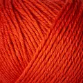 close up af garnnoegle heavy merino fra knitting for olive i farven blodappelsin