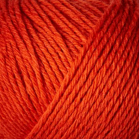 close up af garnnoegle heavy merino fra knitting for olive i farven blodappelsin