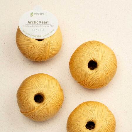 4 garnnoegler i kvaliteten arctic pearl fra pascuali i farven lemon
