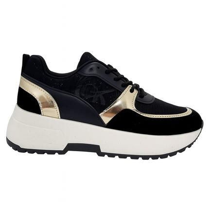 Chunky damesneaker i sort med gulddetaljer og slangemønster