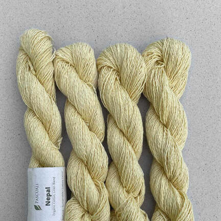 4 garnnoegler af maerket nepal fra pascuali i farven baby yellow