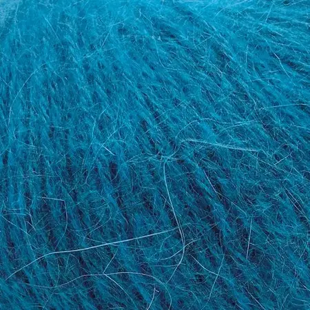 Close up af garnnoegle i angora fra mondial i farven Turkis - 656