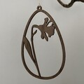 Påskeæg ornament i valnødfiner med påskelilje