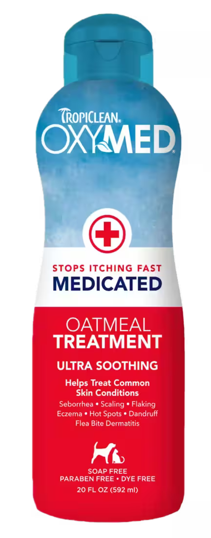 Flaske med TropiClean OxyMed Medicated Oatmeal Treatment til hunde og katte – 592 ml – kløestillende balsam mod skæl, hot spots og dermatitis.